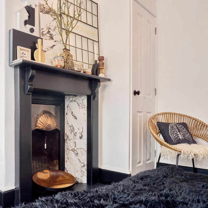 Chimney draught excluder inserted in chimney flue to help reduce energy bills and wind noise.