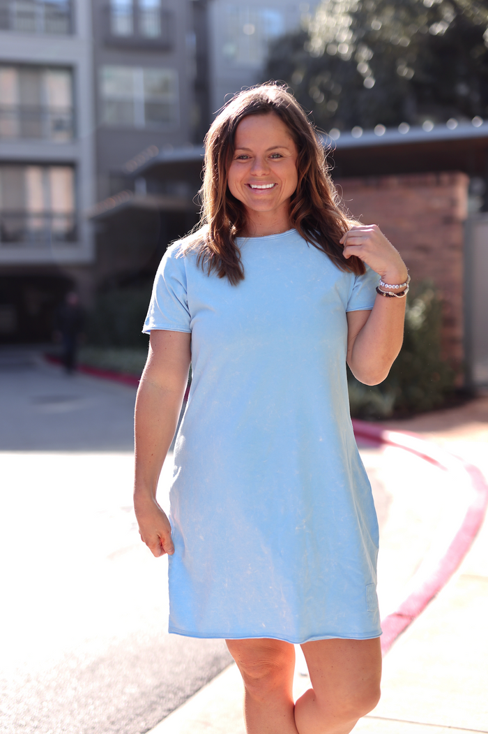Light blue casual women's dress, short sleeves, comfortable cotton blend fabric, perfect for summer outings.