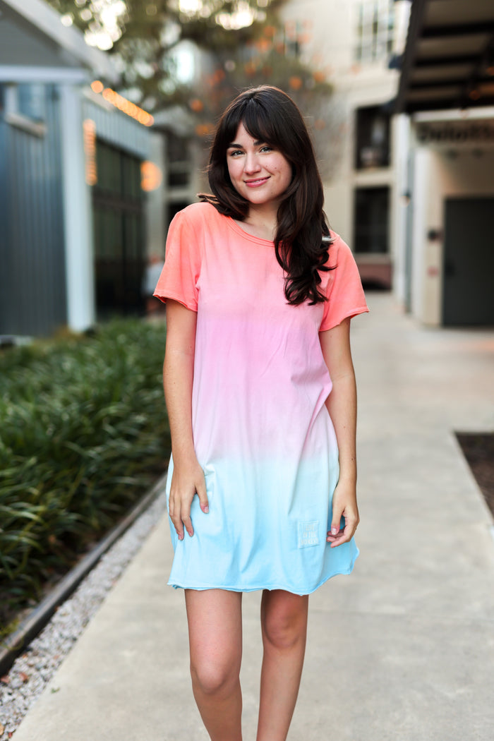 Casual women's dip-dye dress in coral and light blue, soft cotton fabric with pockets.