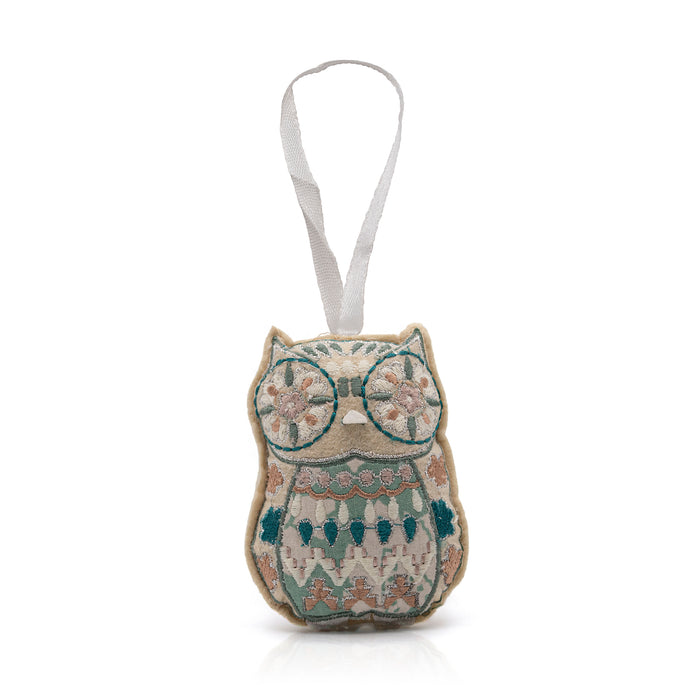 Green embroidered hanging owl decoration.