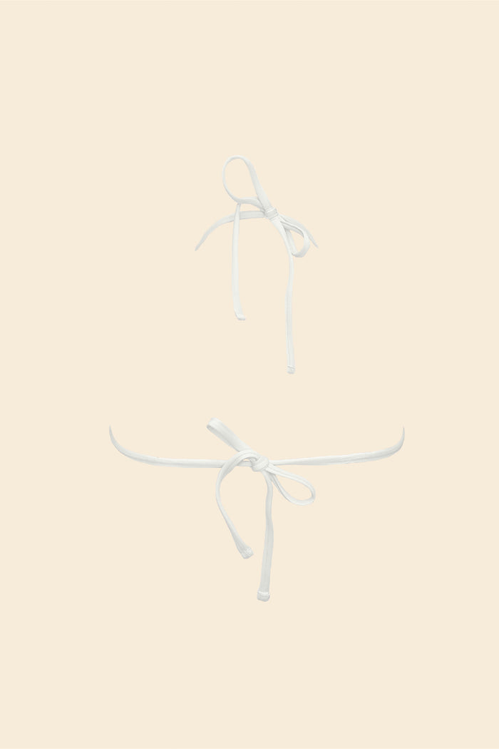 Eyelet fabric detail on Soleil white bikini top