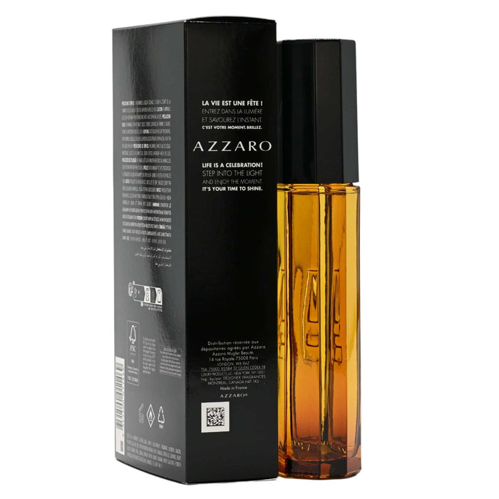 Azzaro Pour Homme Eau de Toilette in an amber glass bottle with a black cap beside a black box