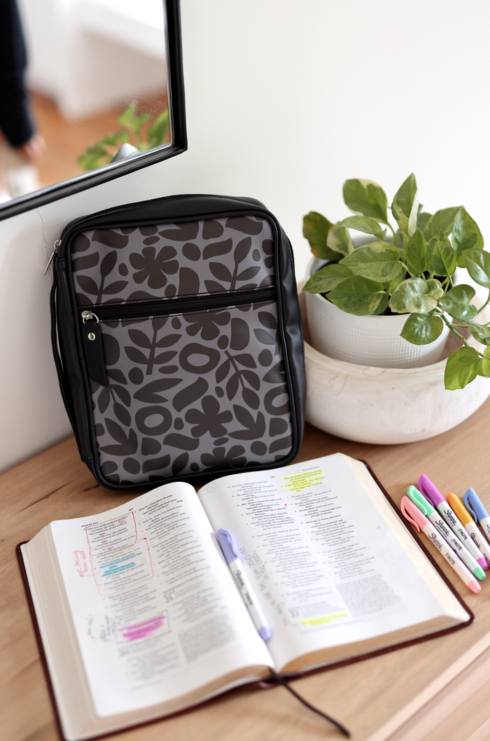 Stylish gray patterned backpack, made of durable material, perfect for school or work essentials.
