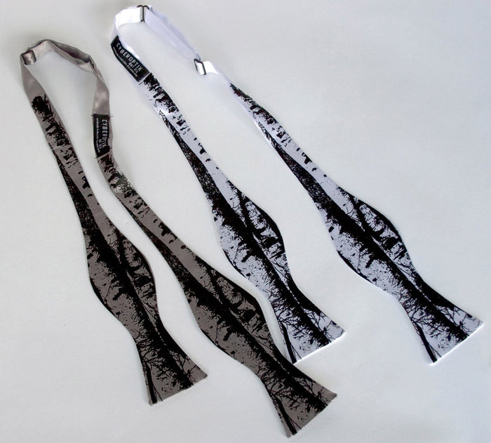Black ink on white, silver bow tie.