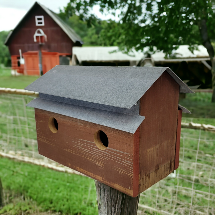 handcrafted barn shaped birdhouse