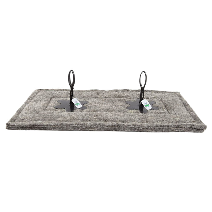 Oblong wool chimney blocker with two recycled plastic handles fitted.