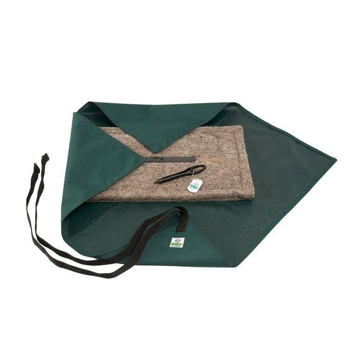 Open green Chimney Sheep wrap with a Chimney Sheep laying on it used to prevent a sooty mess.