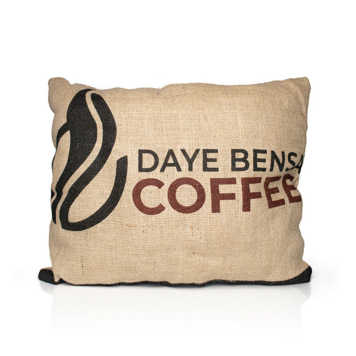 A mix off wool filled, jute hessian outdoor cushion