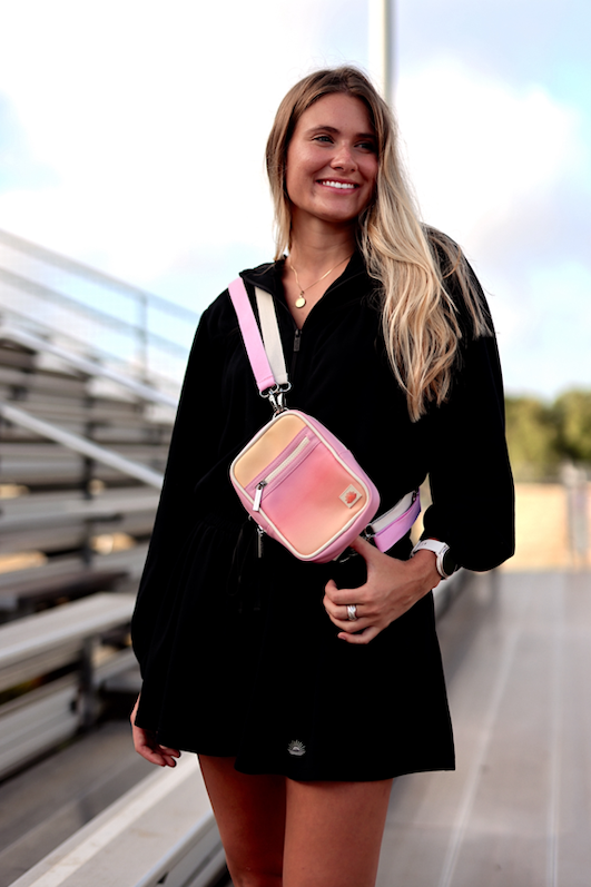 Stylish pink gradient crossbody bag made of durable material, perfect for casual outings.