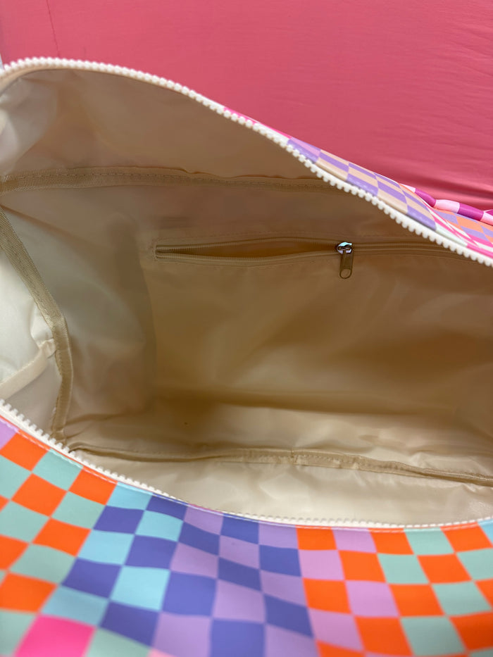 Colorful checkered tote bag interior with zipper pocket and spacious storage.