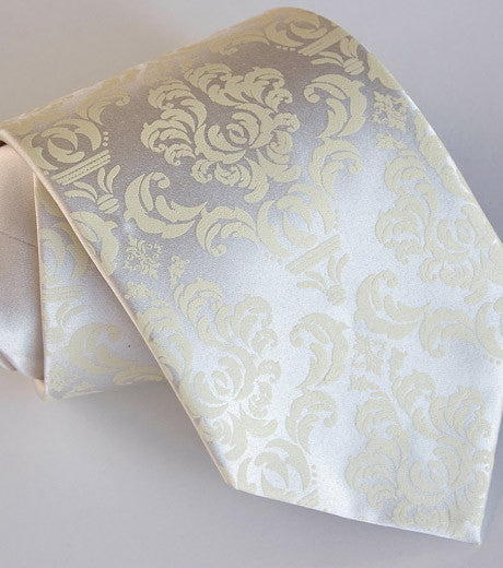 Ivory-cream ink on platinum microfiber.