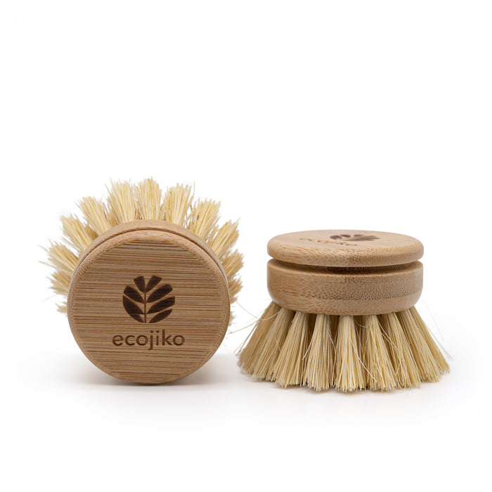 Natural bamboo and sisal dish brush replacement head on a white background