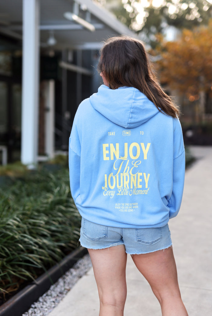 Light blue hoodie with motivational print, perfect for casual wear and comfortable styling.