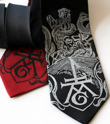 White ink on black, black ink on red.