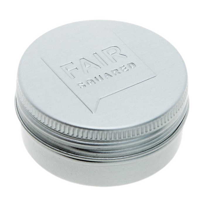 12g tin of fairtrade lip balm on a white background.