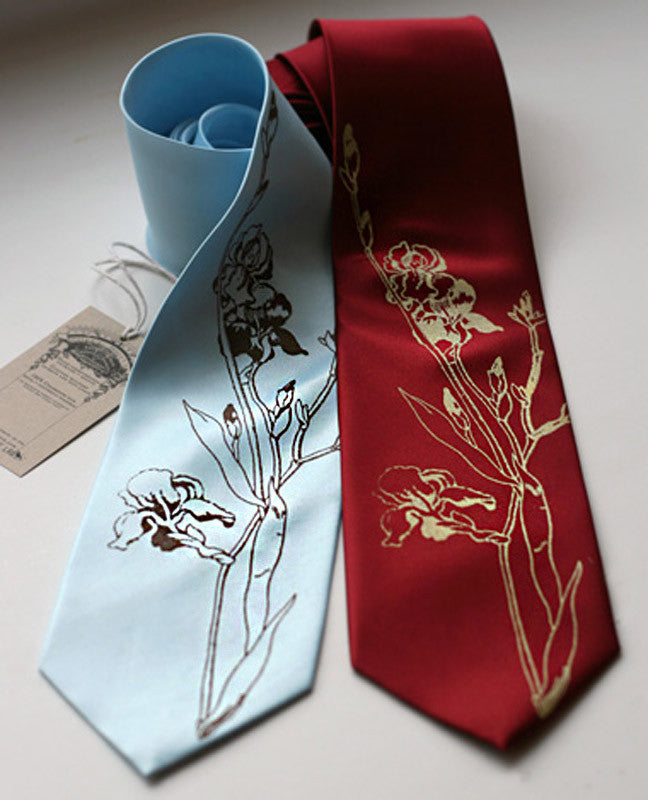 Bronze on sky blue, gold on burgundy.