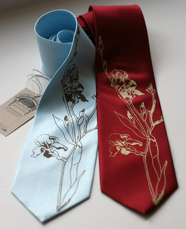 Bronze on sky blue, gold on burgundy.
