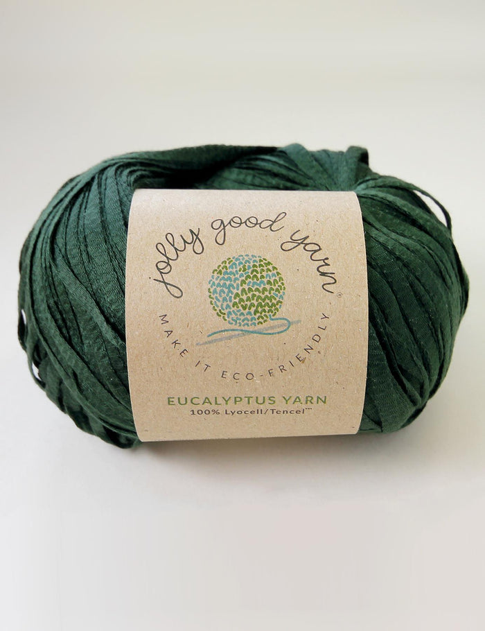 Green skein of yarn with a 'Jolly Good Yarn' label on a white background