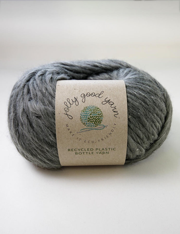 Grey yarn with Jolly Good Yarn label, made of recycled plastic bottles