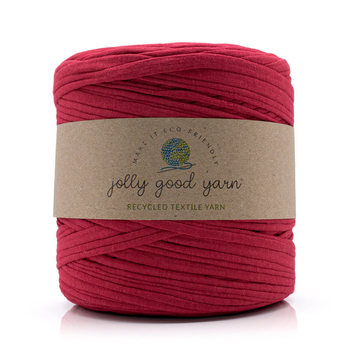 Red ball of yarn with a 'jolly good yarn' label on a white background
