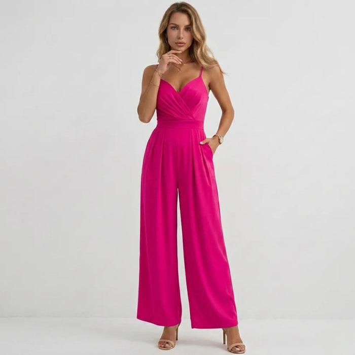 Elegant spaghetti strap pleated jumpsuit, movement shot showing wide leg