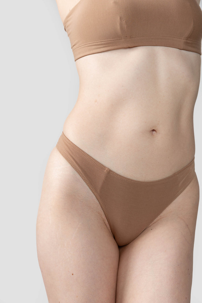 Tan | Model is wearing size M