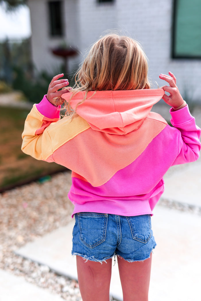 Colorful girls' hoodie in pink, orange, and yellow, perfect for casual wear.