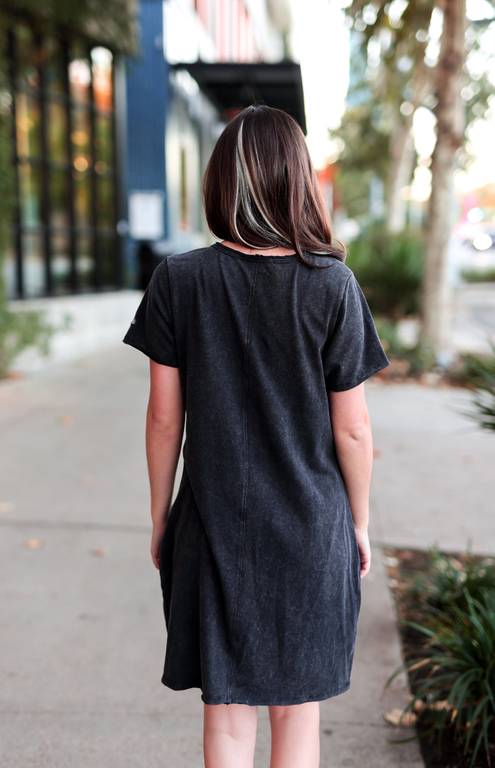 Women's black denim dress with short sleeves, casual fit, perfect for everyday wear.