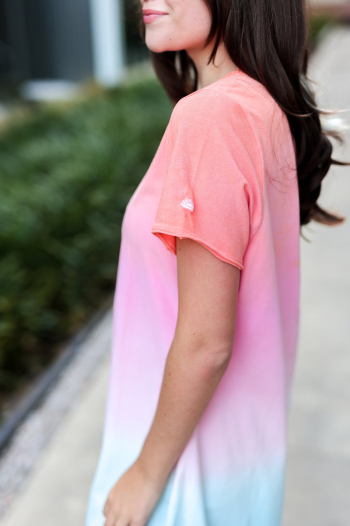 Women's gradient t-shirt in coral and blue, soft fabric with short sleeves, perfect for casual wear.
