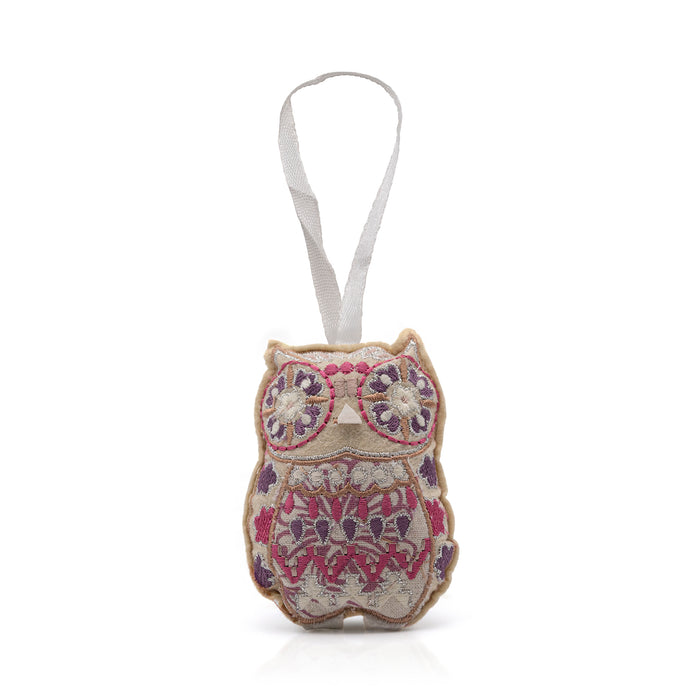 Pink embroidered hanging owl decoration with white hoop.