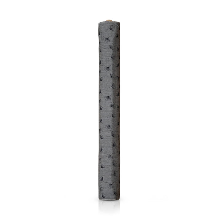 A roll of grey fabric with a black flower pattern, standing vertically on a white background.