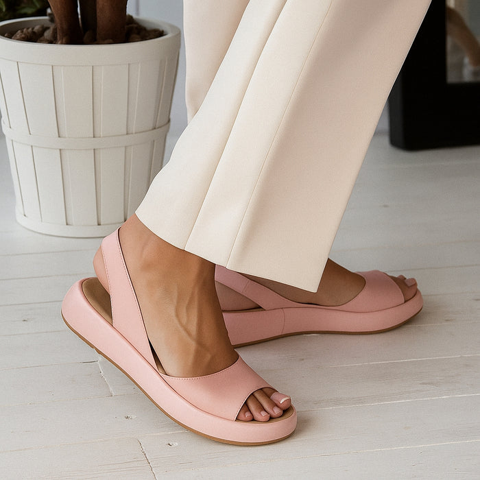 Open-toe slingback flat sandals, on-feet lifestyle view