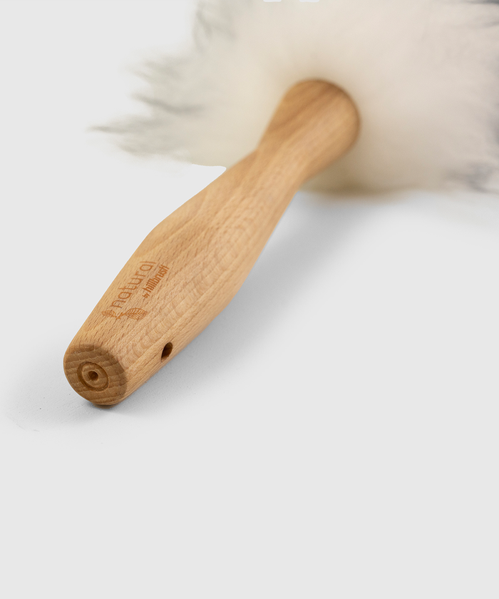 detail of solid beech handle on lambswool duster