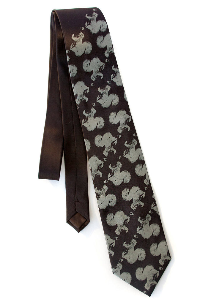 Squirrel necktie. Dove gray print on black.