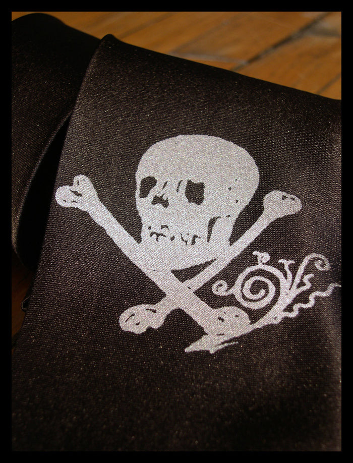 Silver ink on black microfiber.