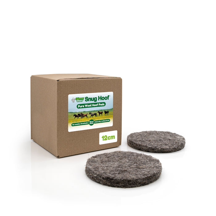 Box of Snug Hoof pure wool hoof pads with two pads on a white background