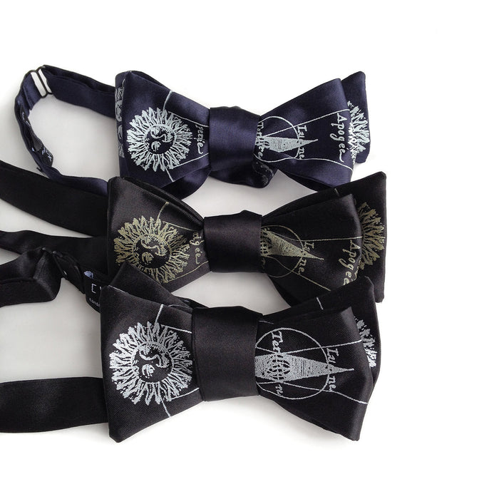 Antique brass on black; silver on black; ice on navy bow tie