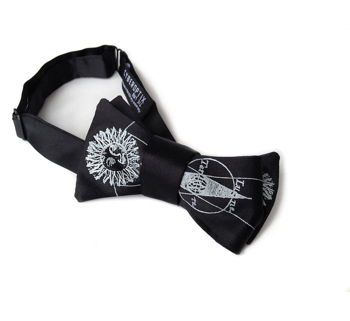 Silver ink on a black bow tie