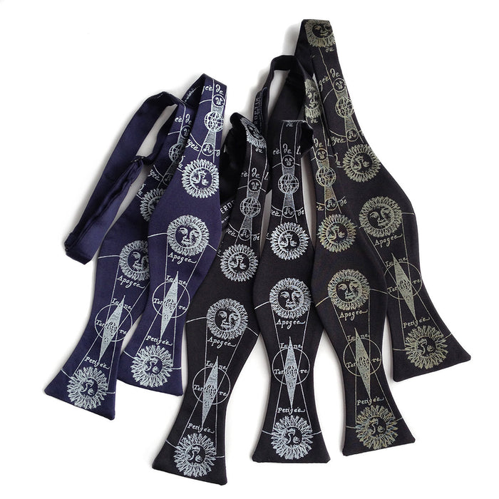 Antique brass on black; silver on black; ice on navy bow tie