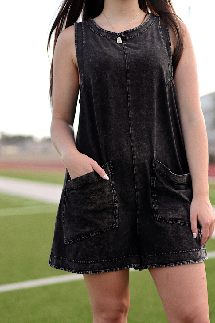 Black denim sleeveless dress with pockets, casual summer style for women.
