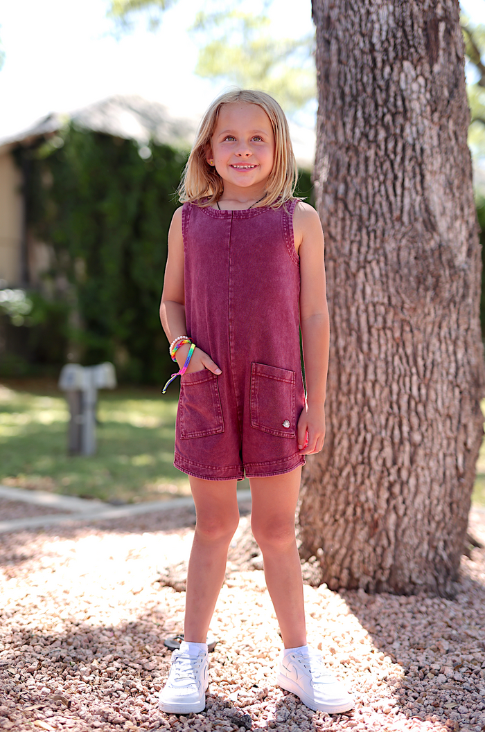 Girls' sleeveless burgundy denim romper with pockets, perfect for summer casual outfits.