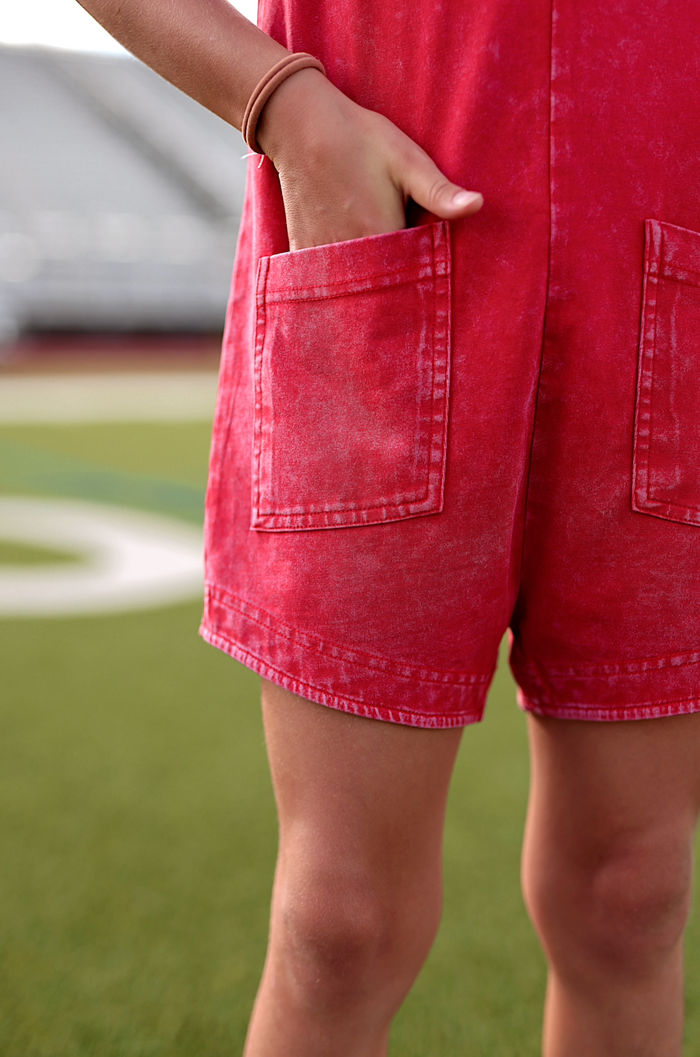 Red denim shorts featuring front pockets, casual style, perfect for summer outings and warm weather.