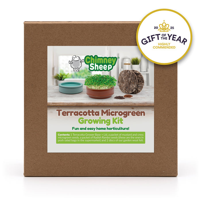 Terracotta microgreen growing kit packaging with 'Chimney Sheep' branding and a 'Gift of the Year' award badge.