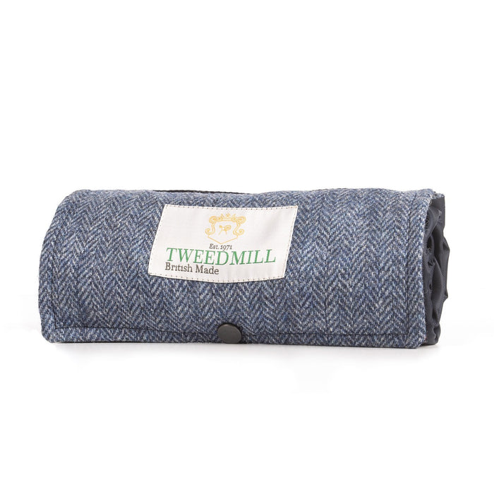 Tweed harringbone blue picnic blanket with waterproof backing.
