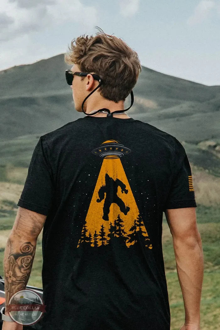 Nine Line Apparel UFOSQUATCH-TSTRI-SOLIDBLACKTRIBLEND UFO Squatch T-Shirt in Black, model