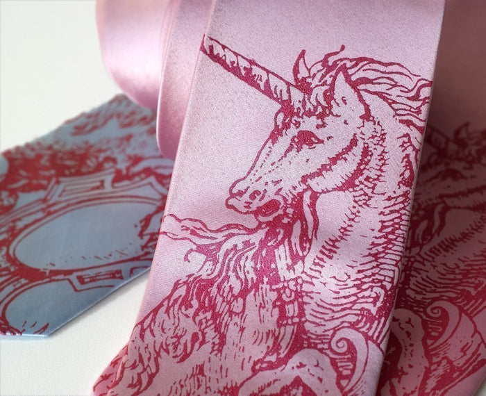 Berry ink on pink, sky blue.