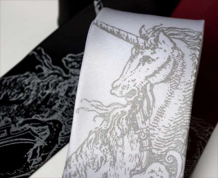 Silver ink on white, black, burgundy.