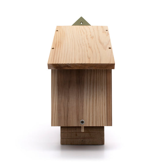 A wooden bat box standing upright on a white background