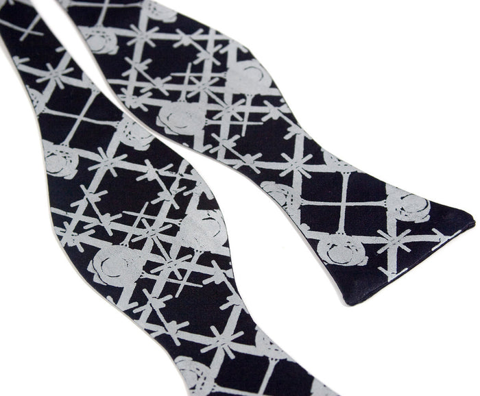 Pale gray ink on navy.