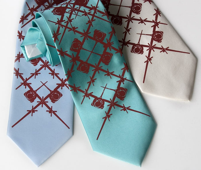 Crimson ink on aqua, sky blue, cream.